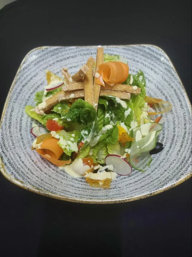 https://astoriacurrent.com/storage/uploads/2026/07/romaine-salad-and-tofu-1-20260723082238-cx558A.webp